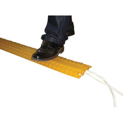 Uniform Safety Signs - 1000 x 132mm - Black Plastic Interlocking Cable Cover (Channel 35mmW x 12mmH) - Foot traffic only | CC150B